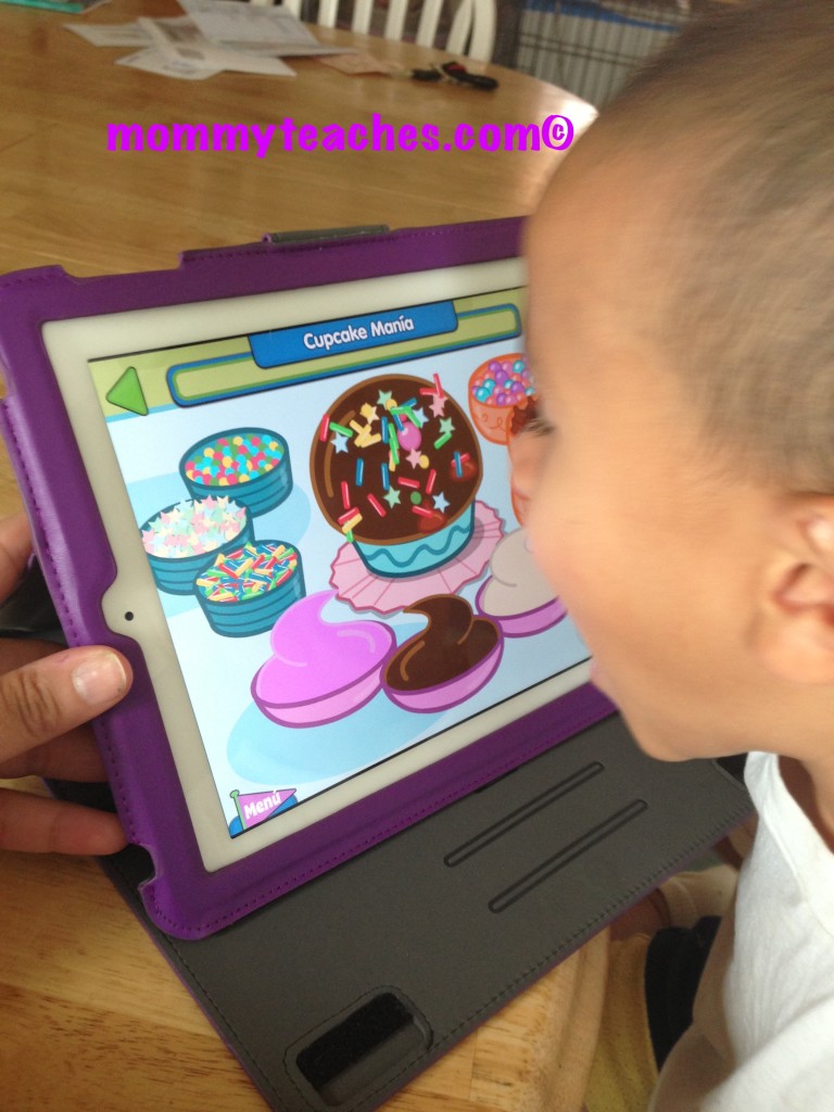 Creating his own cupcake!
